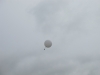Into thin air, 2011, audio event (duration variable), 100+ gr weather ballon, helium, mp3 player, satellite phones. Terminal Convention, Cork International Airport, Eire, 2011