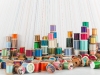 Colorial, 2014, installation, 300 coloured thread spools, variable dimensions, unique pieces. Photo © Skyler Edwards