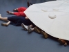 Couvre-chef sans chef (Un chapeau à porter à onze) - series Objects to Connect, 2019, marker pen, aluminium foil, cardboard, scotch tape, yoga mat, linen thread, Ø 400 x 15 cm, unique piece. Exhibition view of Possiblement Nous, Galerie du Crous, Paris, France, 2019. Photo © Savina Ivaylova Topurska