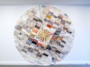 Éventail (Une couleur de nous-mêmes pour la dernière fois), 2017 - 2021, papier attrape-couleurs, bois de chêne, fils dorés, laiton + costume associé, éventail plié : 167 cm haut, éventail déplié : 280 cm diamètre, pièce unique. Vue de l’exposition Milieu Mouvant, Pal Project, Paris, France, 2021. Photo © Antony Caillliau