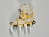 Crampons Alpinisme, 2024, ceramic, wool, variable dimensions, unique piece. View of the exhibition Une androsace, Vénus et ses bergèr.es, Centre d’art contemporain Les Capuçins, Embrun, France. Photo © François Deladerriere