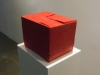 Manual, 2015, grease pencils, pedestal, box, melted wax, text made by paper peels from the grease pencils, variable dimensions, unique piece. Installation view in BIFT Exhibition hall, Beijing, China