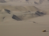 When I buried the Book of Sand..., 2009, photographie avec cadre, 57,5 x 46 cm, édition de 5 + 2 EA. Le désert d’Atacama où la première édition de El Libro de Arena fut enterrée, perdue